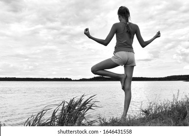 Black And White Photograph. Meditation On The Shore. Healthy Outdoor Lifestyle