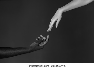 Black And White Photography. All Lives Matter Concept. Black And White Male And Female Hands In Black And White Photo. BLM Concept. 