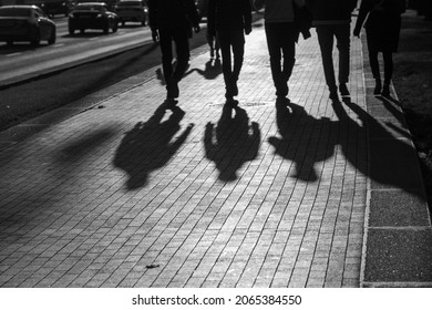 Black and white photography.  Five friends are walking around the city of Moscow.  Silhouettes of people walking on the road - Powered by Shutterstock