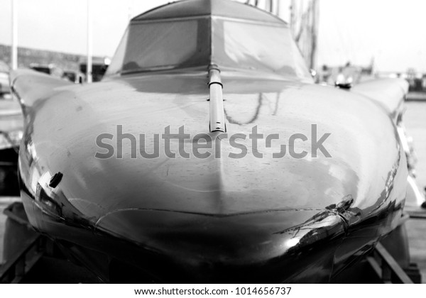 black and\
white photography racing boat, sports\
boat.