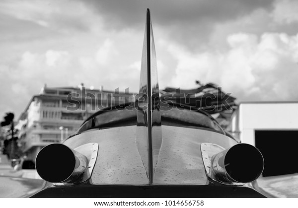 black and\
white photography racing boat, sports\
boat.