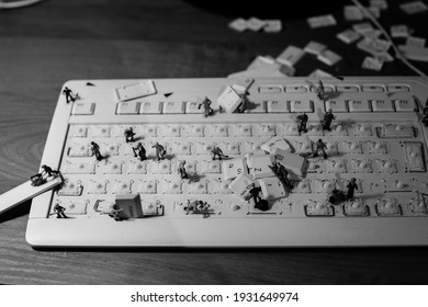 Black And White Picture About Little Worker Men Cleaning A Keyboard, IT Workers, Keyboard Disassembly, Keyboard Cleaning, Keyboard Repair 