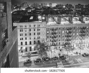 Black And White Picture Of Harlem Neighborhood At Night, New York City, USA.