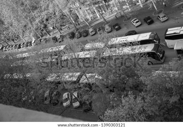 Black and\
white picture of traffic jam with\
buses