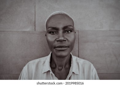 Black And White Portrait Of African Middle Aged Woman - Elderly Afro Female Looking In Front Of Camera