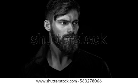 Similar – Image, Stock Photo Dramatic portrait of Black adult man looking up into spotlight while standing on stage in theater with low light copy space