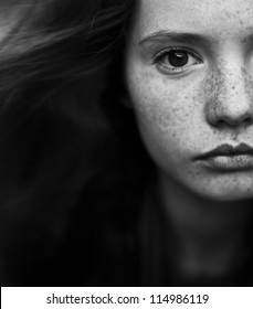 Black And White Portrait Of A Beautiful Girl With Freckles