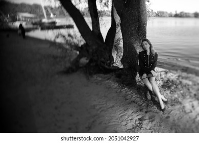 Black And White Portrait Of Beautiful Woman Near Water