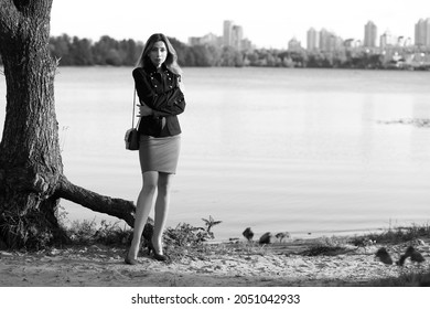 Black And White Portrait Of Beautiful Woman Near Water