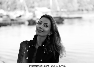 Black And White Portrait Of Beautiful Woman Near Water