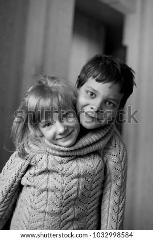 Similar – Mother with her seven year old daughter laughing in a cabin in the countryside.