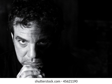 Black And White Portrait Of A Pensive Man