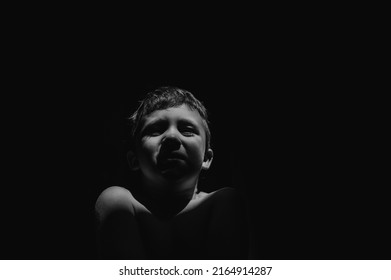 Black And White Portrait Of Sad Anonymous Little Boy Crying