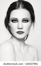 Black And White Portrait Of Young Beautiful Woman With Smoky Eyes