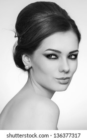 Black And White Portrait Of Young Beautiful Woman With Stylish Hair Bun