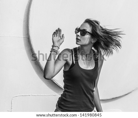 Similar – Image, Stock Photo Smiling brunette girl holding surfboard over her head