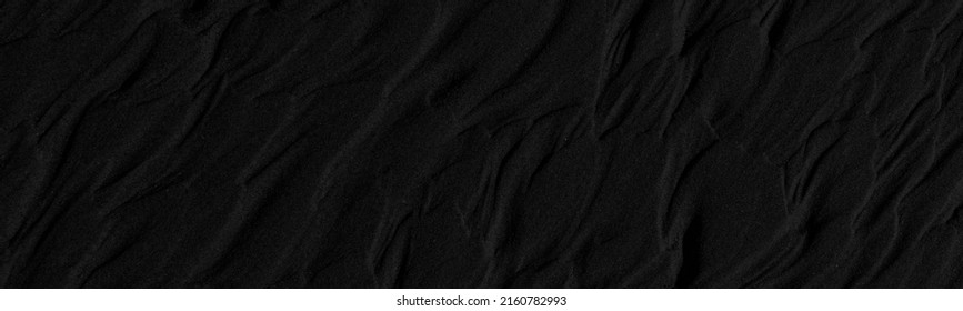 Black and white poster texture sand in the desert. Panaroma Sand texture. abstract texture line wave. Sand Waves Abstract Black and White background. Volcanic rock texture. Black salt. Black Sand.