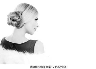 Black And White Profile Portrait For A Holiday Background Of A Young Aristocratic Lady With A Perfect Evening Make Up And Hair Style In Chignon Wearing A Red Dress And White Fur Coat