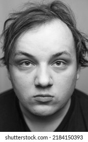 Black And White Raw Portrait Of Man With Messy Hair