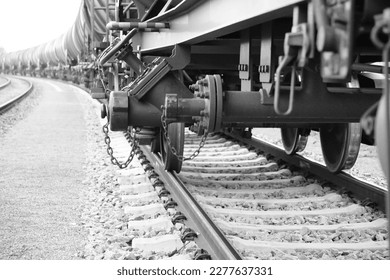 Black and white recording of rails, rail traffic, railroad tracks with train excerpts
				