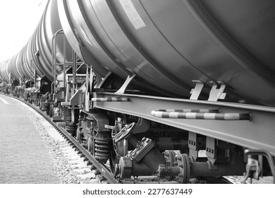 Black and white recording of rails, rail traffic, railroad tracks with train excerpts
				