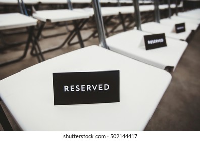 Black And White Reserved Sign. Reservation For Seat At Event.