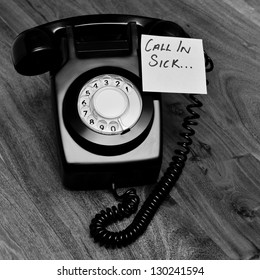 Black And White Retro Phone With Reminder To Call In Sick