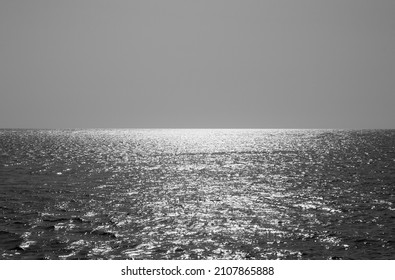 Black And White Sea Water Horizon Line. Seawater Surface Texture