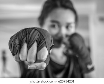 Black And White Selected Focus Of Young Beautiful Women Wear A Red Thai Boxing Tape Ready For Punching