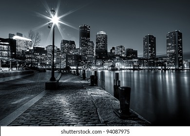 Black and White shot of Boston Harbor and Financial district in Boston, Massachusetts.