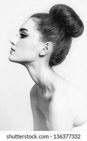 Black And White Shot Of Young Beautiful Girl With Hair Bun