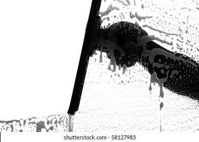 Black And White Silhouette Of A Window Washer Washing A Window