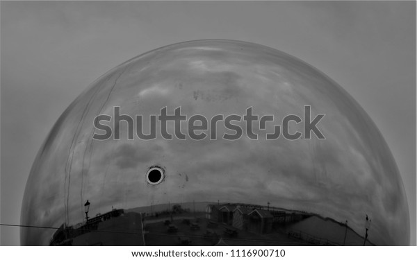 Black and White Southend on Sea reflection in\
Chrome Ball Globe