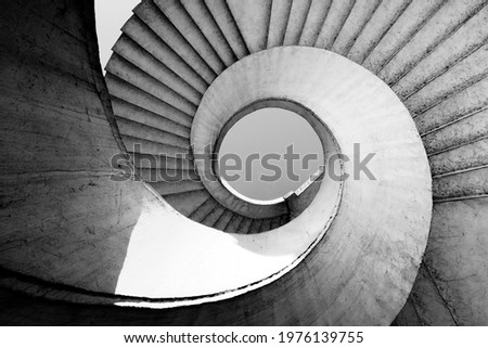 Black and white spiral stairs abstract design. Round steps near the Gdanski bridge in Warsaw, Poland