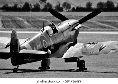 Black And White Spitfire Aircraft On The Ground