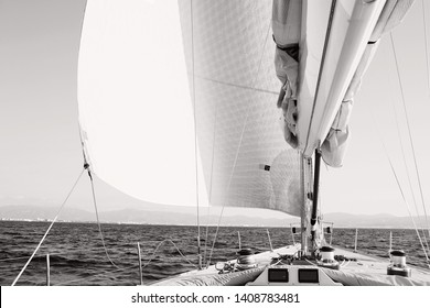 Black and white still life of beautiful high end luxury sailing yacht on sunny vacation coastal destination, sky and sea, travel transportation conceptual aspirational lifestyle, adventure outdoors.