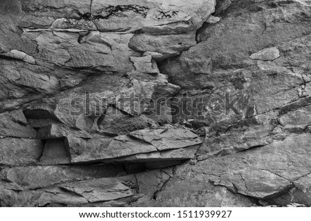 Black white texture map rock blocks. Mining cliff rough surface. Coarse limestone quarry backdrop. Heavy grunge damage natural wall background. Crack antique medieval marble front facade for design 3d