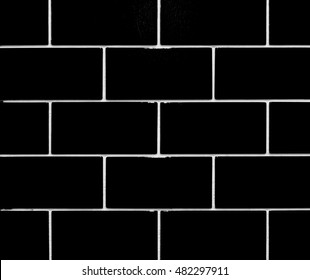 Black and white tiles wall background 