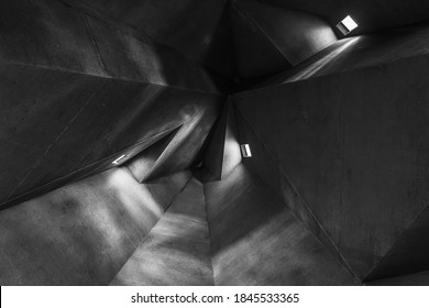 Black and White tone and mood, Detail of rough raw concrete ceiling with abstract geometric patterns with light and shadow of brutalist architecture church. - Powered by Shutterstock