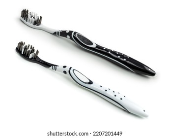 Black White Toothbrush Isolated On A White Background.