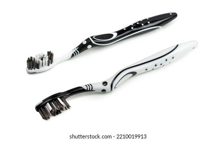 Black White Toothbrush Isolated On A White Background.