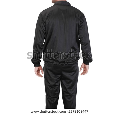 black and white tracksuit on male model shot isolated on white background 