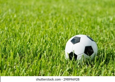 Black And White Traditional Soccer Ball Football Futbol On Grass