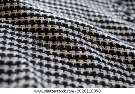 Black and white tweed texture composition as background