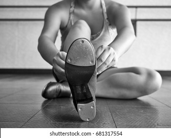 Black and White Version of Dancer Putting on her Tap Shoes