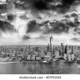 Black and white view of Downtown Manhattan skyline, New York City at sunset.
