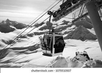 Black and white view on ski lift at ski resort. Caucasus Mountains in winter, mount Elbrus.