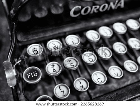 Black and white vintage typewriter. Qwerty keyboard