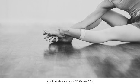 Black And White Wallpaper Faceless Ballet Dancer Warming Up In Studio Copy Space Room For Text. No Face Dancing Female Feet Legs Stretching Indoors Toes Professional Arts. Modern Contemporary Art