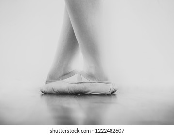 Black And White Wallpaper Faceless Ballet Dancer Warming Up In Studio Copy Space Room For Text. No Face Dancing Female Feet Legs Stretching Indoors Toes Professional Arts. Modern Contemporary Art 